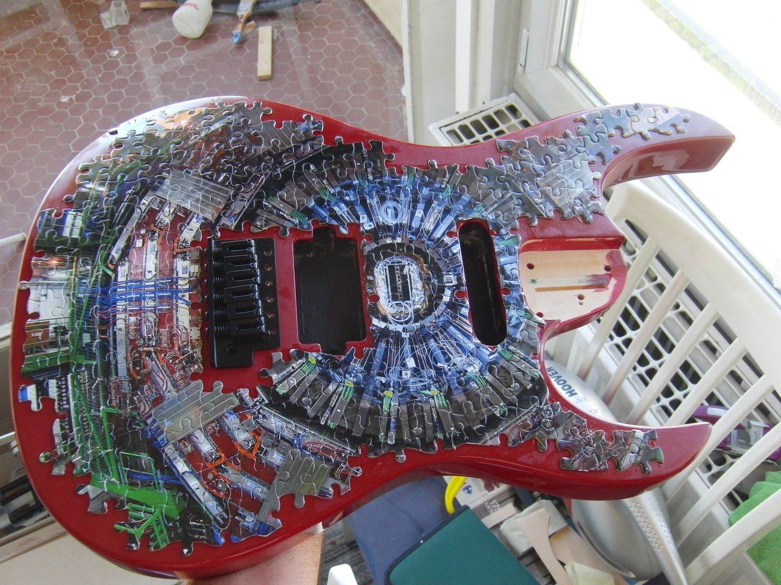 The jigsaw-puzzle body of the CMS guitar
