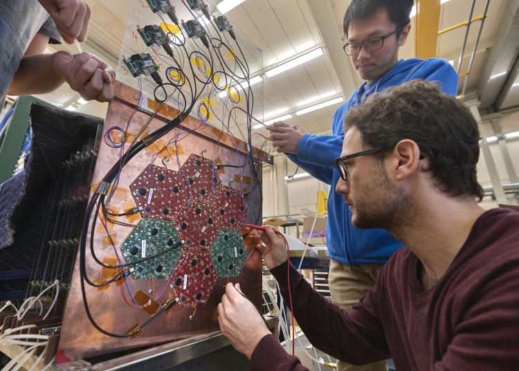 Prototype sensors. The assembly of prototype HGCAL detector plates, based on 6" silicon modules, at CERN in October 2018.