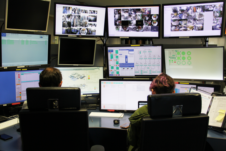 CMS members working in the control room during the pilot beams