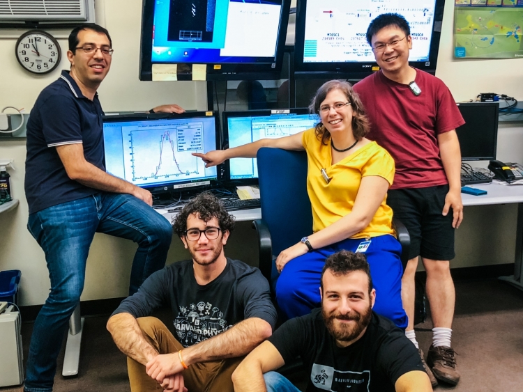 Testing of prototypes for the CMS timing detector for the HL-LHC upgrade. CMS Scientists from Fermilab, University of Kansas, INFN Torino and Caltech in the in the Fermilab Test Beam Facility (FTBF) control room. The peak on the screen shows the measured time resolution of 25 ps with prototype sensors for the timing detector. (June 2018) Credit A. Apresyan