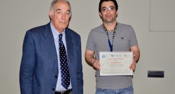 Josh Bendavid together with Professor Massimo Altarelli, brother of the late Guido Altarelli.
