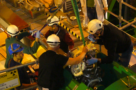 Teams from CMS and CERN replacing the bellows unit