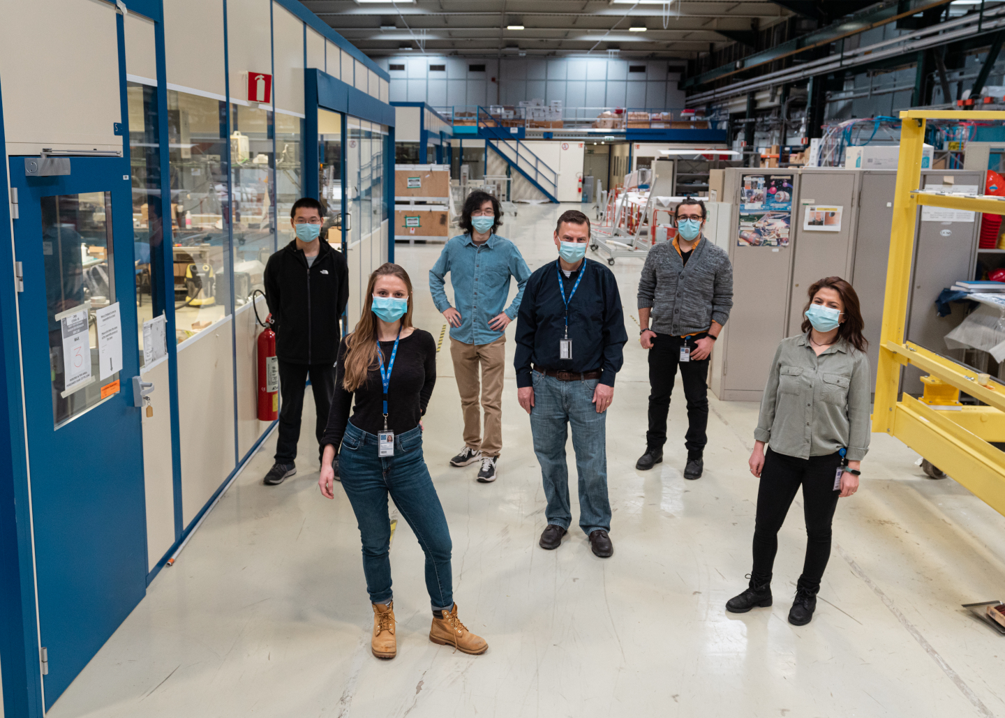 Our rework team group photo, taken outside of the CMS HCAL Clean Room in CERN Building 904. Back Row, Left to Right: Long Wang, Sebastian (Xuli) Yan, and Furkan Dolek. Middle: Jay Dittmann. Front, Left to Right: Grace Cummings, and Fatma Boran. Not pictured, Markus Seidel and Irina Tlisova. Credit: S.J. Hertzog, CERN