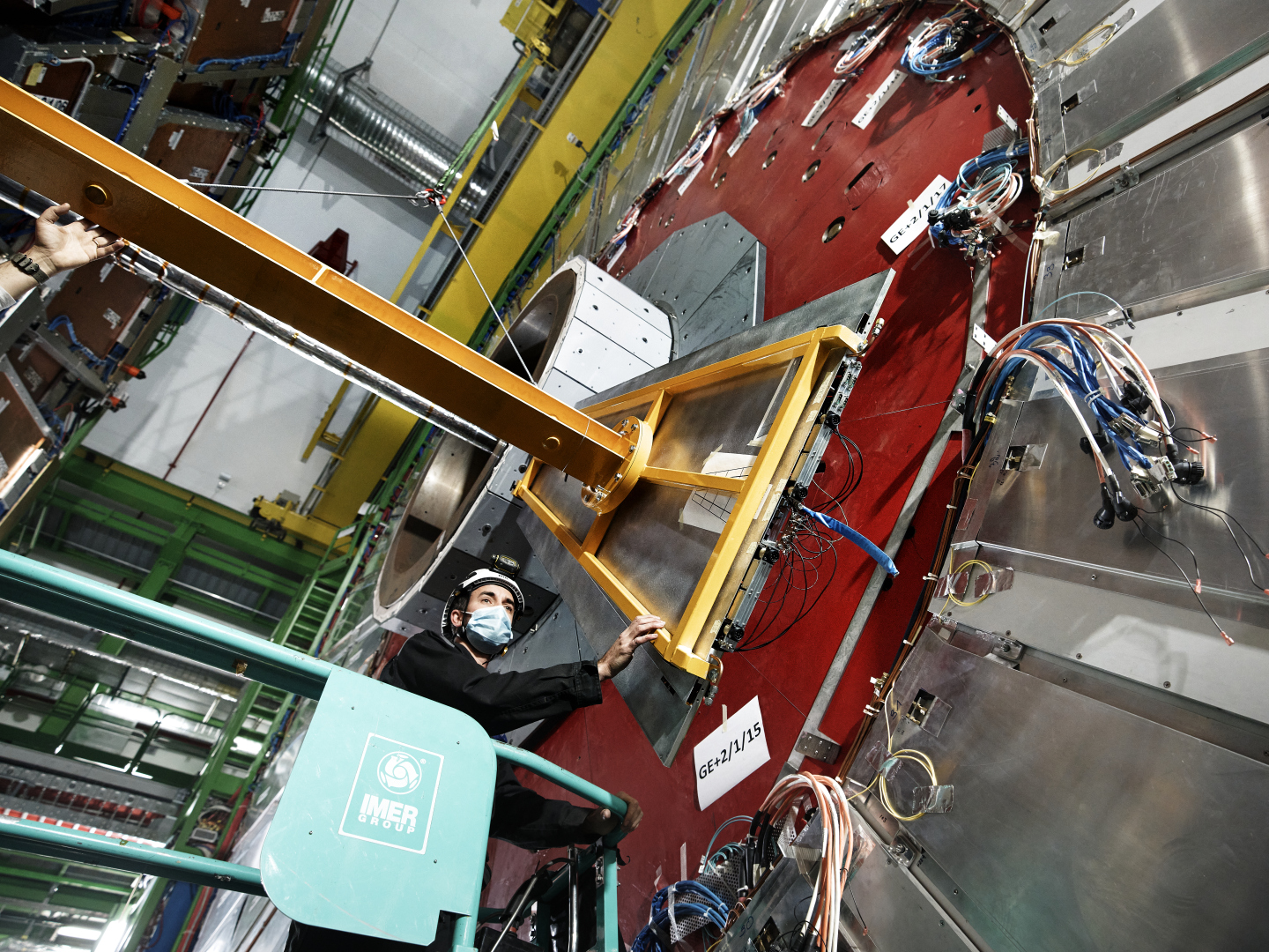 GE2/1 demonstrator being carefully attached to the CMS experiment where it will be connected to low voltage, high voltage, and cooling.