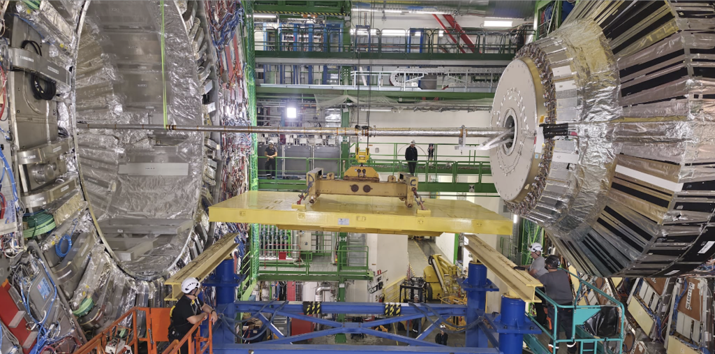 The CMS detector opened for LS3 interventions. Although its familiar structure remains visible, extensive dismantling and preparation work is already under way behind and around the detector.